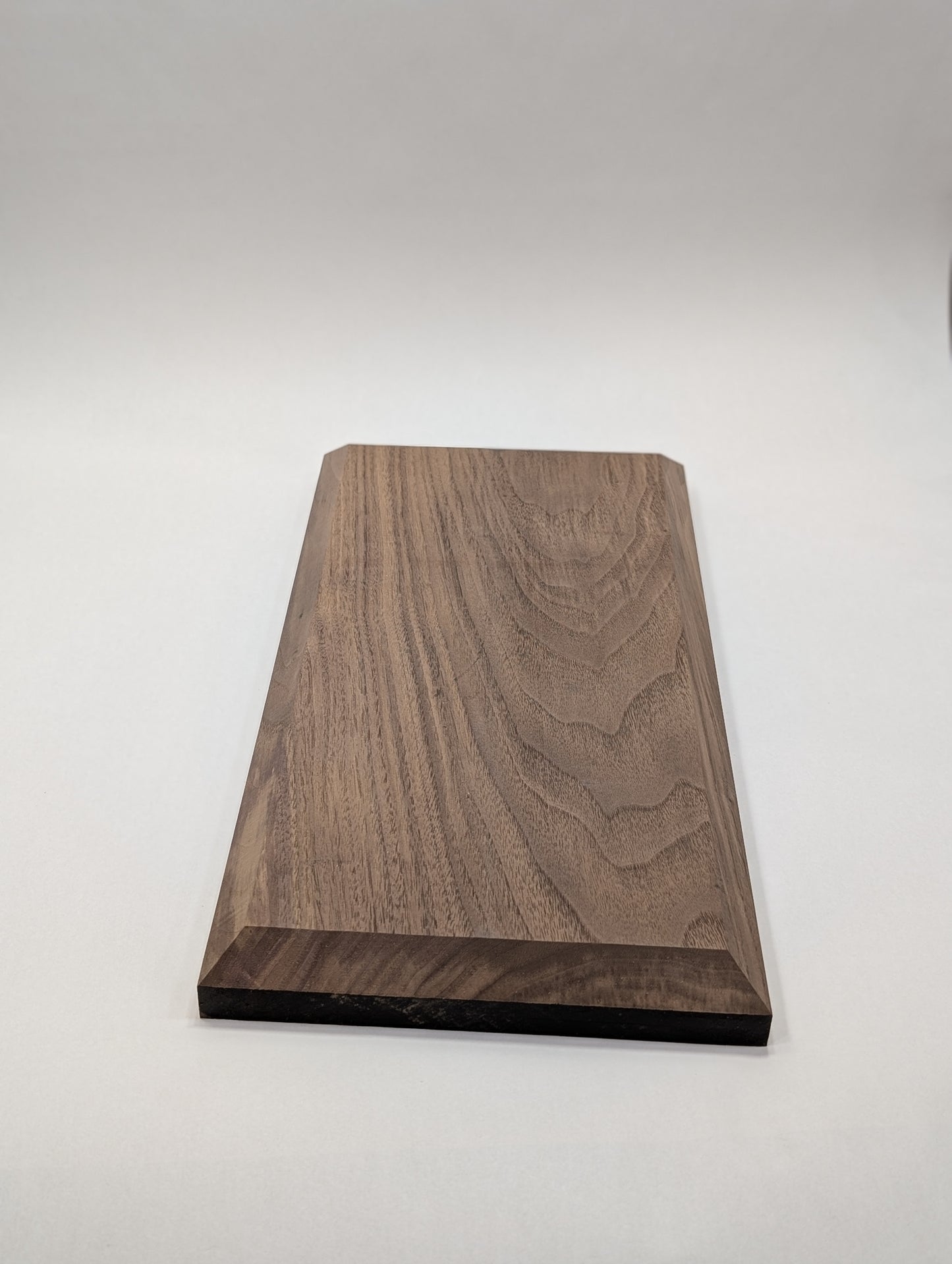 Black Walnut Display Base with chamfered edge shaped and ready to finish