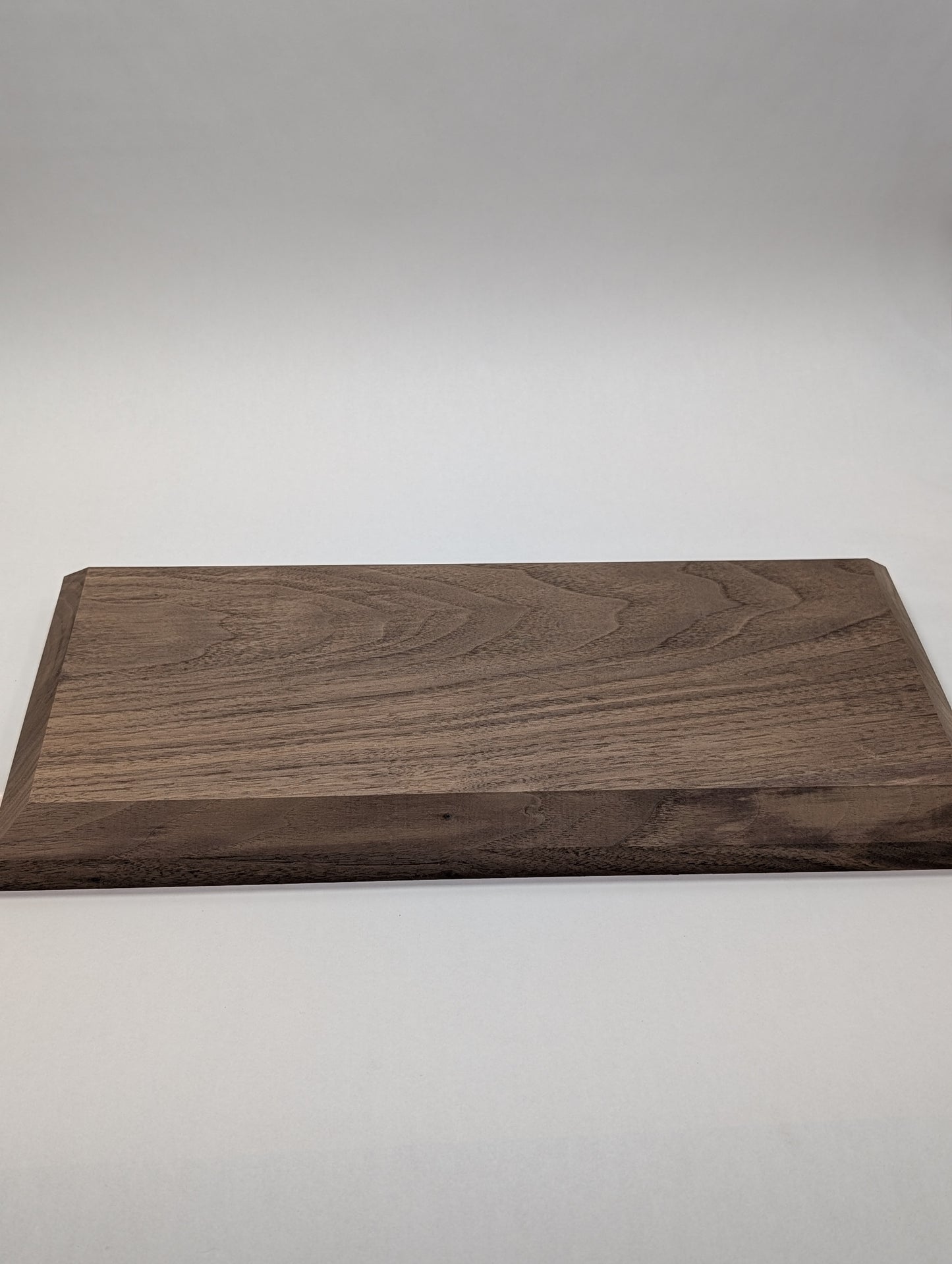 Black Walnut Display Base with chamfered edge shaped and ready to finish